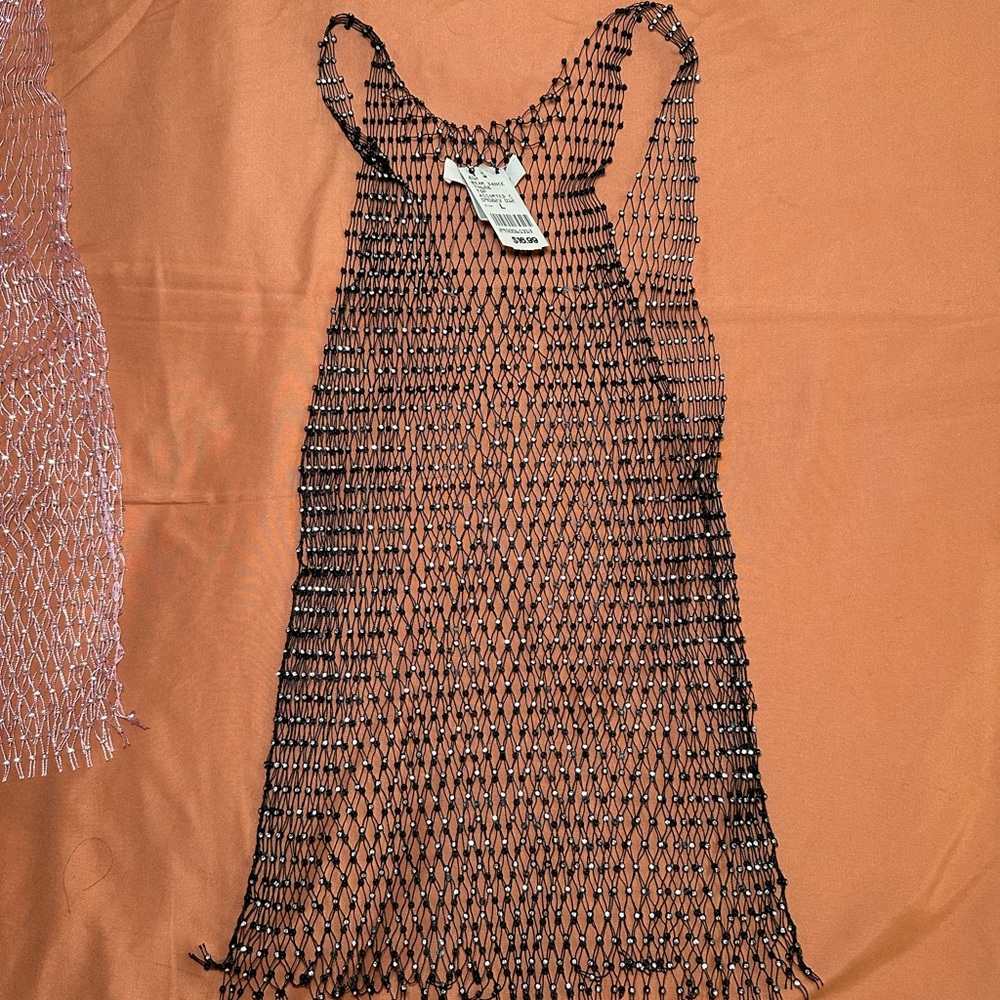 Black and pink mesh tank tops with rhinestones